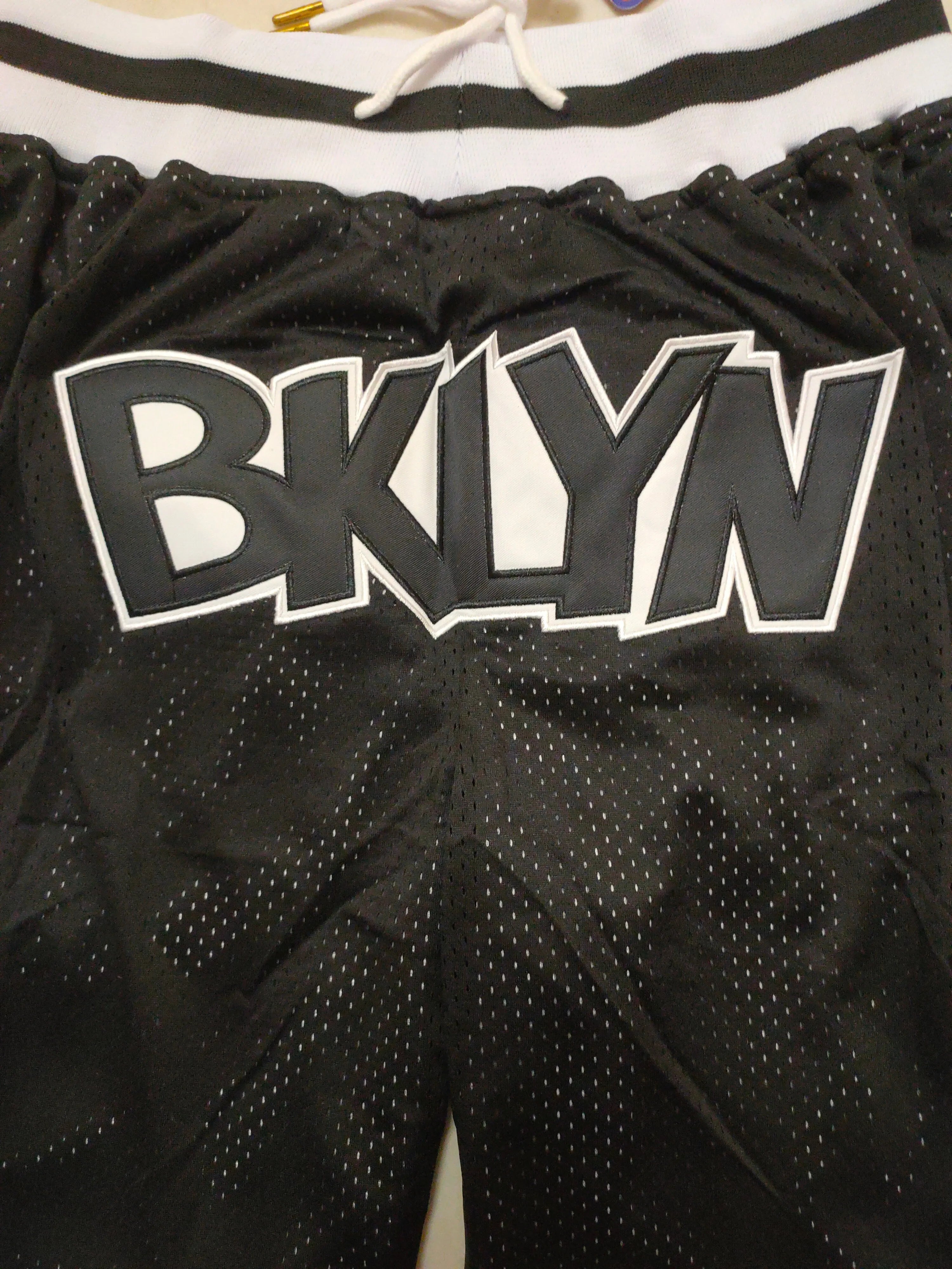 Brooklyn Nets black size 11 pocket pants
