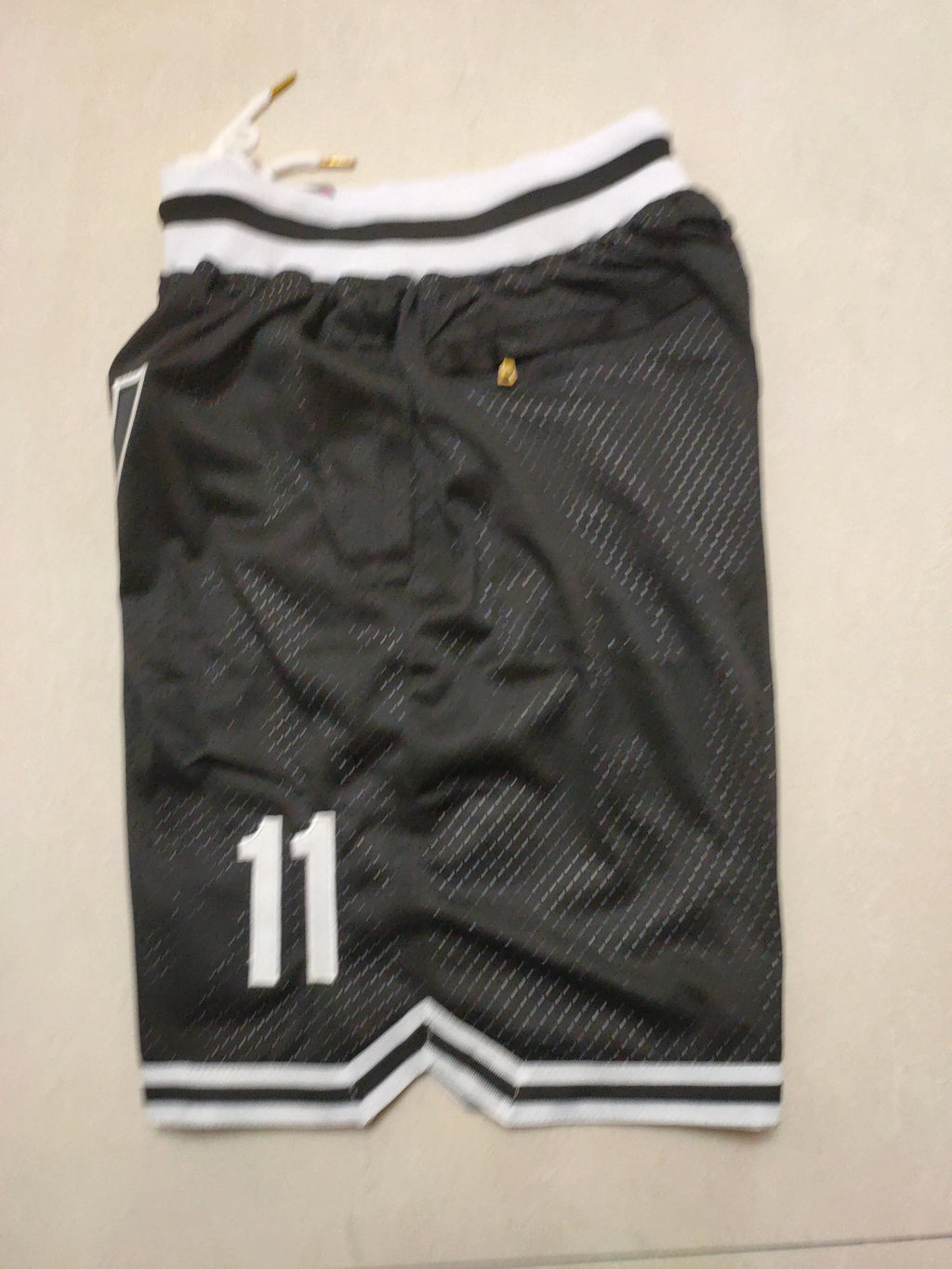 Brooklyn Nets black size 11 pocket pants