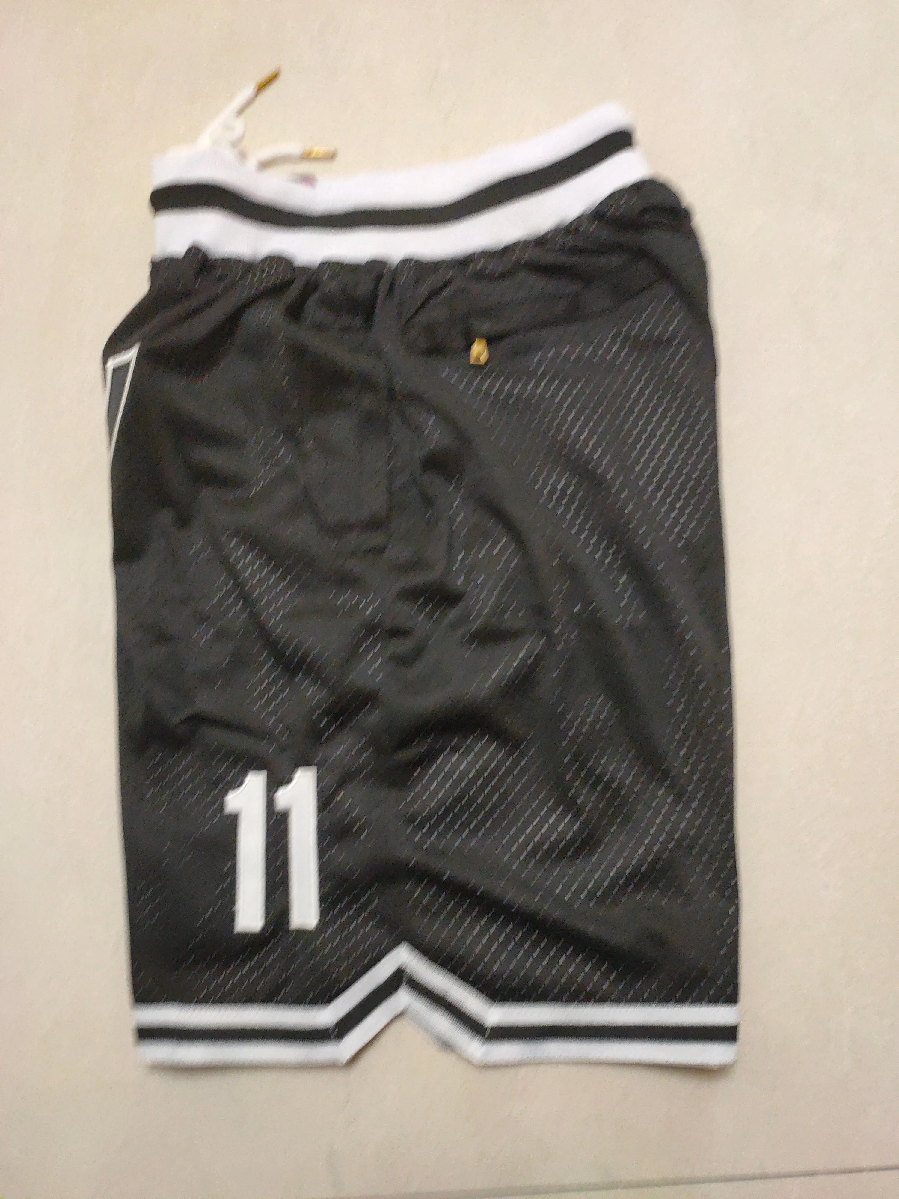 Brooklyn Nets black size 11 pocket pants